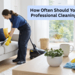 Professional cleaning in Ottawa showing cleaners vacuuming a sofa and wiping a coffee table in a bright, organized living room.